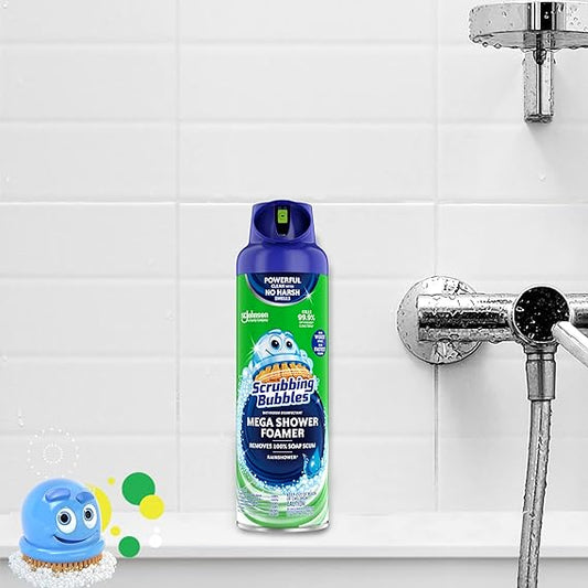 Scrubbing Bubbles Mega Shower Foamer bottle with a shower head and cleaning brush on a tiled bathroom wall.