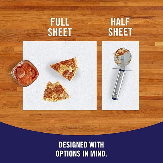 Two sheets of paper with pizza slices and a pizza cutter on a wooden surface.