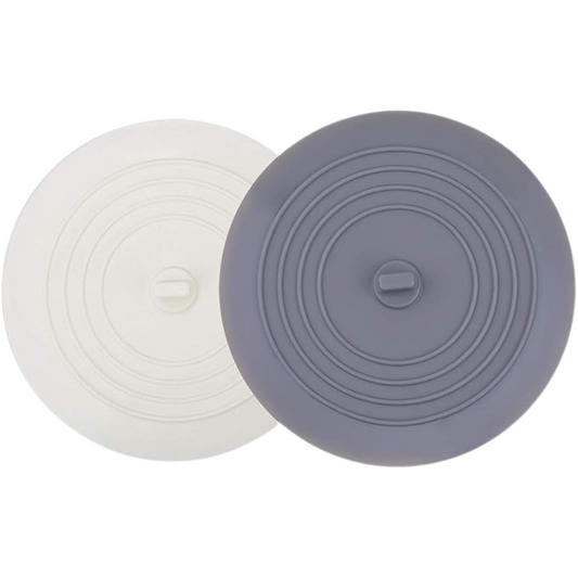 Two silicone lids, one white and one gray, on a white background