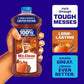 Mr. Clean Spiced Harvest cleaner bottle held by a hand with product features on a blue background