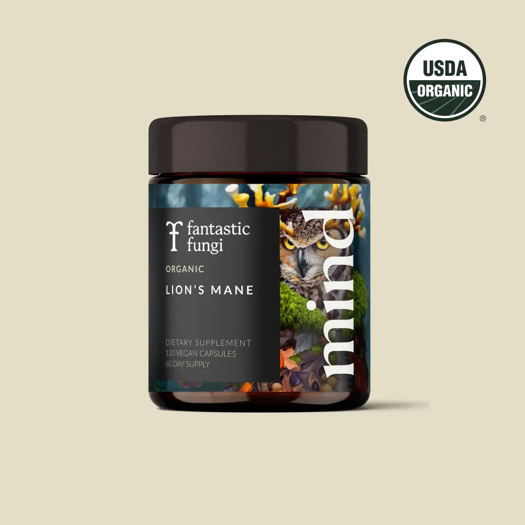 Jar of 'Fantastic Fungi Organic Lion's Mane' dietary supplement with USDA Organic label on a beige background