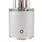 Clear perfume bottle with silver cap and textured white label on a white background